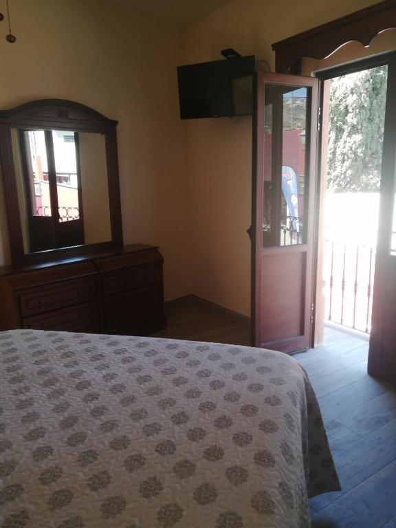 Postel nebo postele na pokoji v ubytování Hotel San Diego