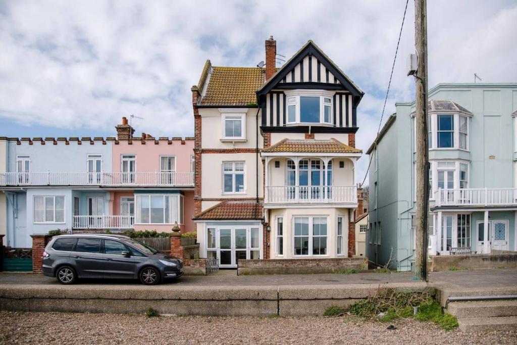 a car parked in front of a large house at Tower House, Aldeburgh in Aldeburgh