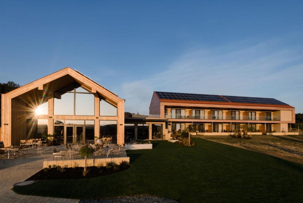 a large building with a lawn in front of it at JUFA Hotel Neutal in Neutal
