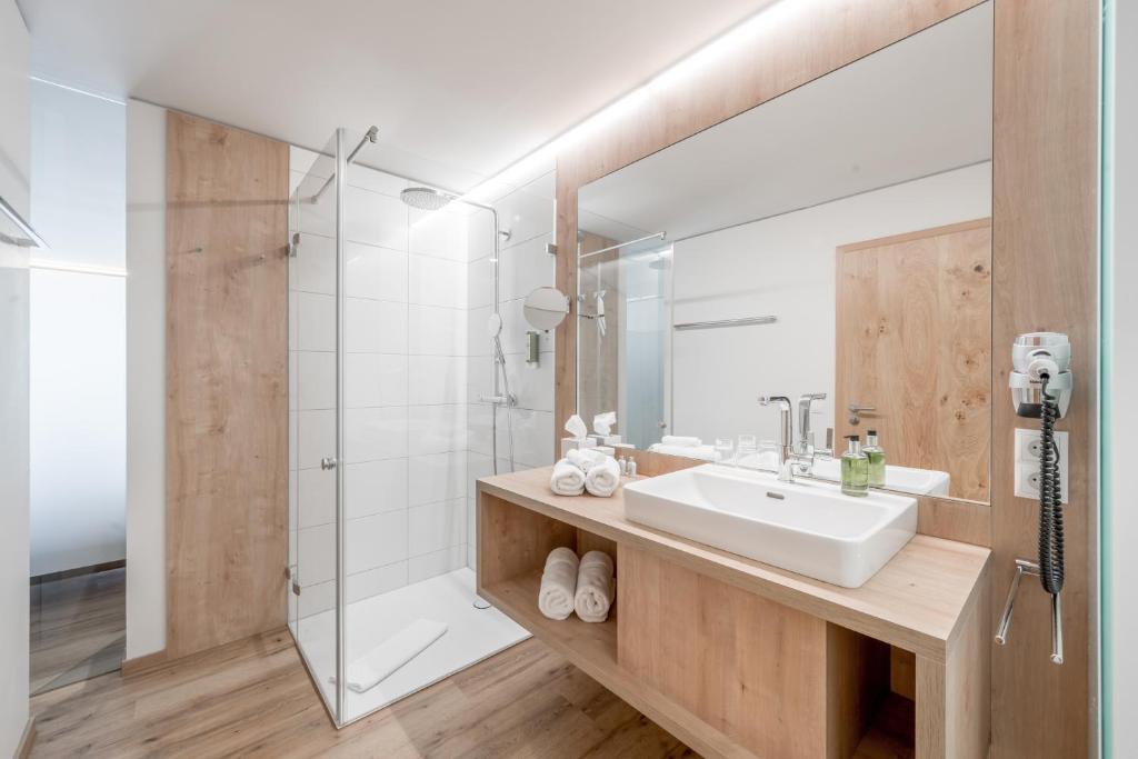 Koupelna v ubytování Alpenhotel Zimba