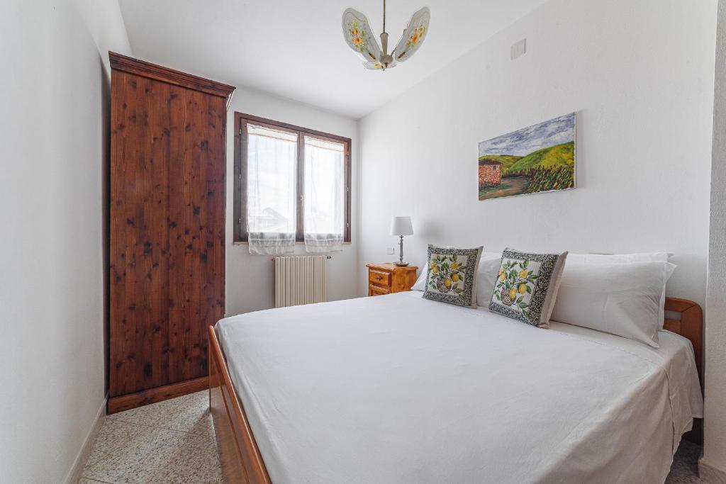 Posteľ alebo postele v izbe v ubytovaní Donoratico Comfort and Relax on the Etruscan Coast