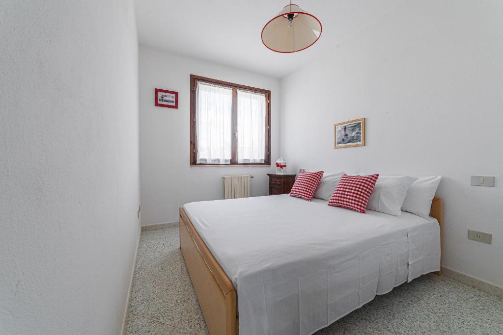 Posteľ alebo postele v izbe v ubytovaní Donoratico Comfort and Relax on the Etruscan Coast