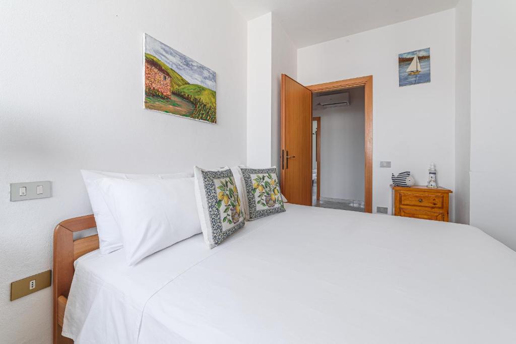 Posteľ alebo postele v izbe v ubytovaní Donoratico Comfort and Relax on the Etruscan Coast