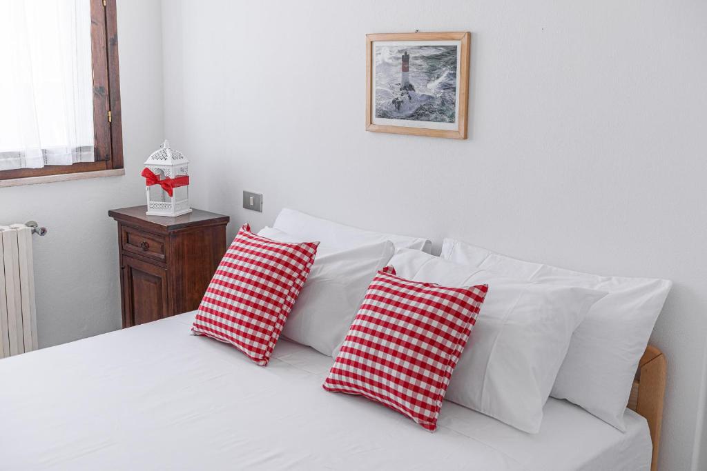 Posteľ alebo postele v izbe v ubytovaní Donoratico Comfort and Relax on the Etruscan Coast