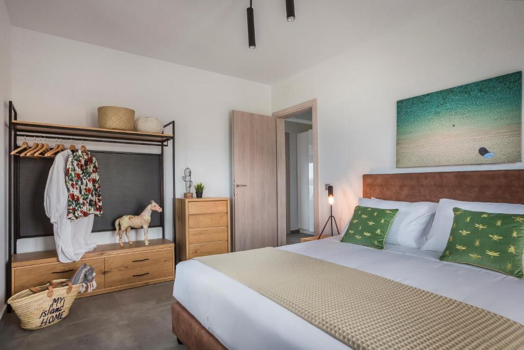 Postel nebo postele na pokoji v ubytování Ionian Village