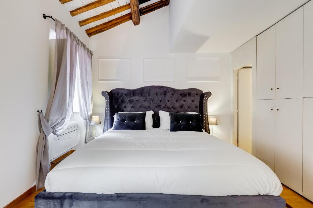 Posteľ alebo postele v izbe v ubytovaní NAVONA SQUARE - RomeDreamHome