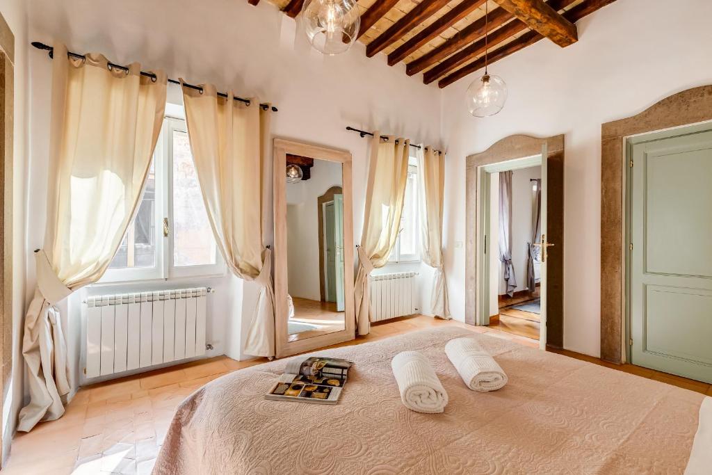 Posteľ alebo postele v izbe v ubytovaní NAVONA SQUARE - RomeDreamHome