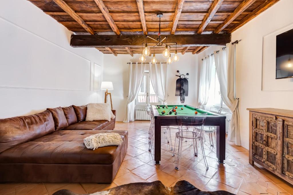 Televízia a/alebo spoločenská miestnosť v ubytovaní NAVONA SQUARE - RomeDreamHome