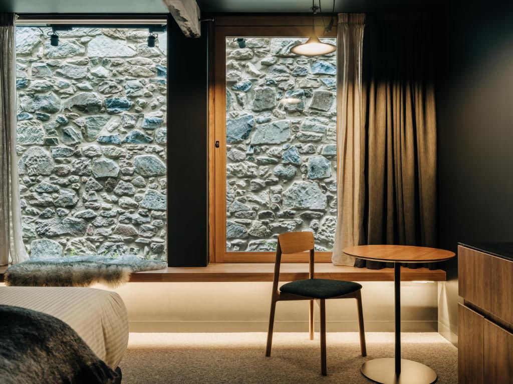 Postel nebo postele na pokoji v ubytování Moss Hotel