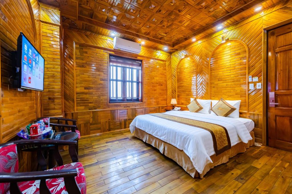 Postel nebo postele na pokoji v ubytování TheKing Hotel