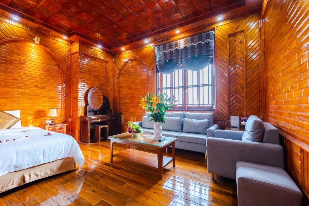 Postel nebo postele na pokoji v ubytování TheKing Hotel