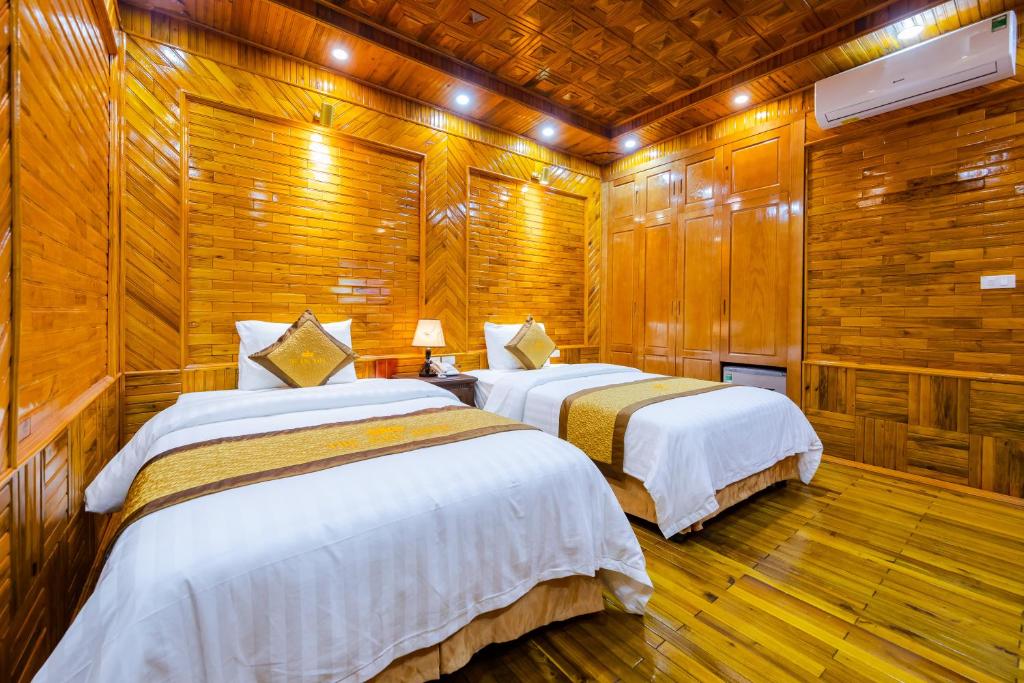 Postel nebo postele na pokoji v ubytování TheKing Hotel