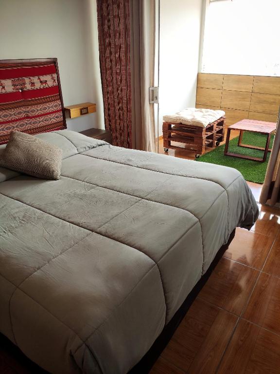Postel nebo postele na pokoji v ubytování Casa Mirador guesthouse