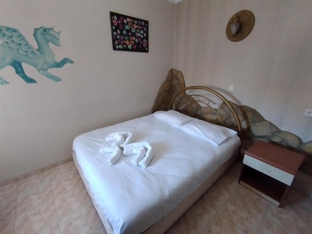 Postel nebo postele na pokoji v ubytování Anz Guest House Pansiyon