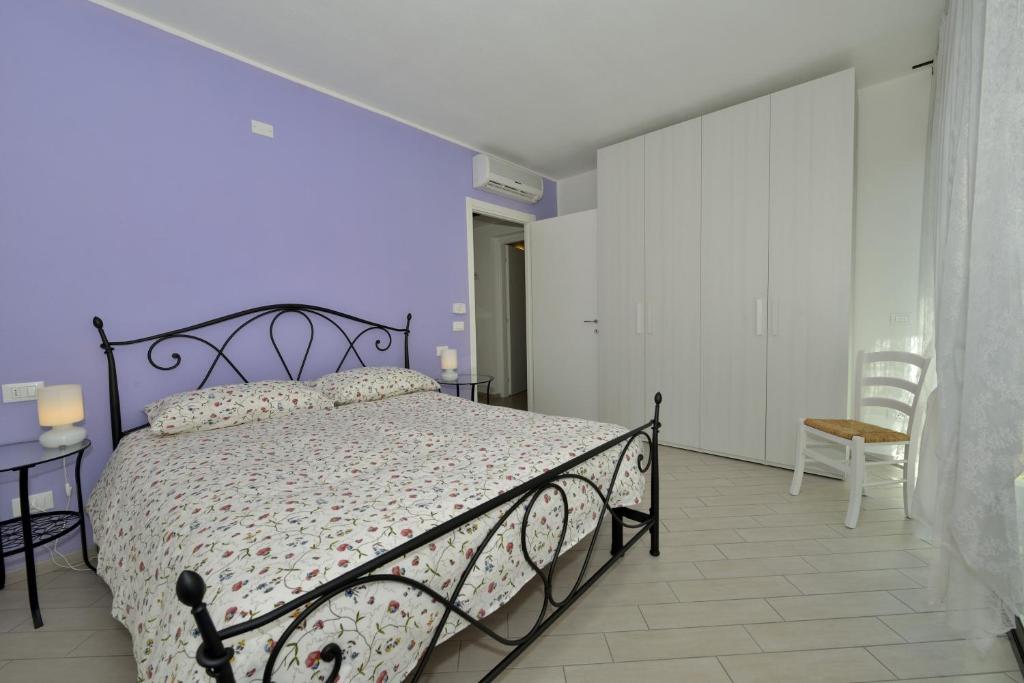 Postel nebo postele na pokoji v ubytování Residence Serenella