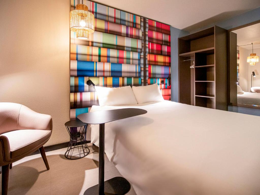 Postel nebo postele na pokoji v ubytování ibis Styles Perpignan Centre Gare
