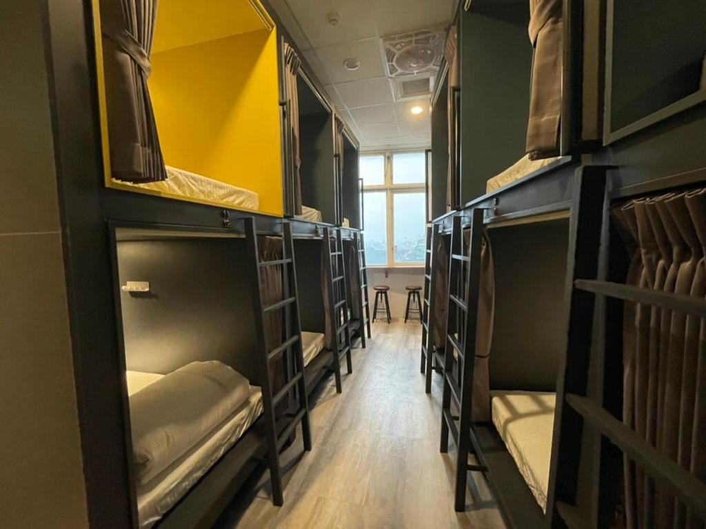 Postel nebo postele na pokoji v ubytování One Night Hostel
