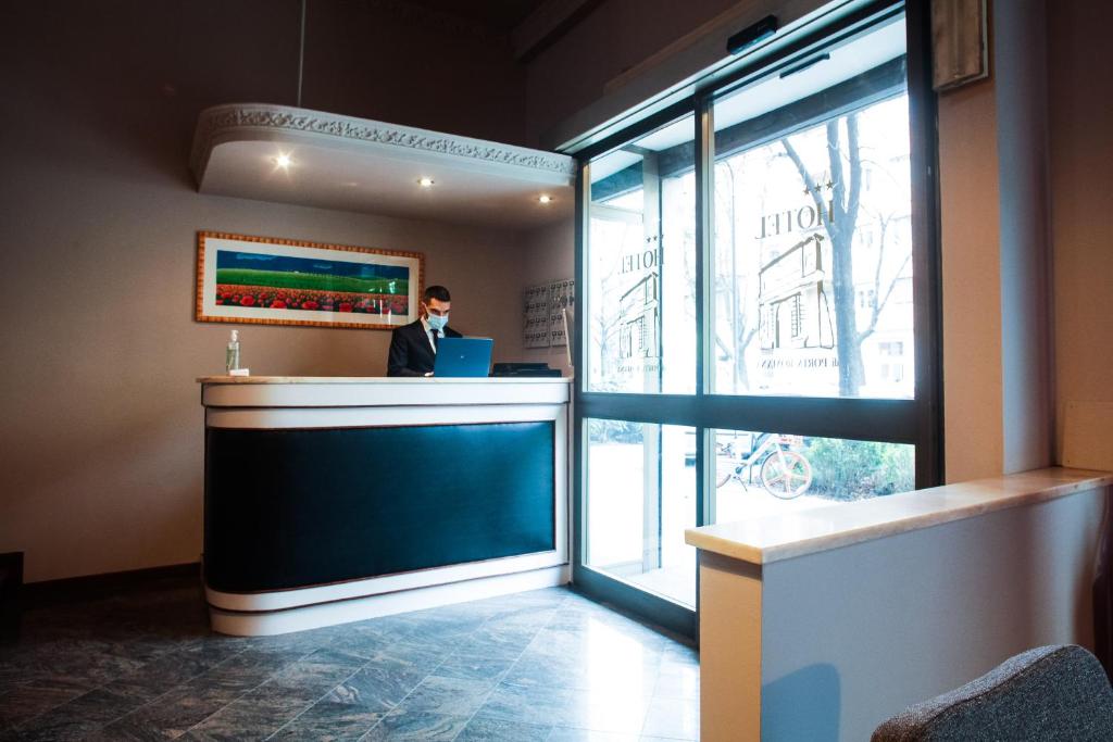 Kuchyň nebo kuchyňský kout v ubytování Hotel di Porta Romana