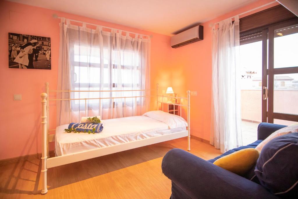 Postel nebo postele na pokoji v ubytování Arenda Villa Rosa