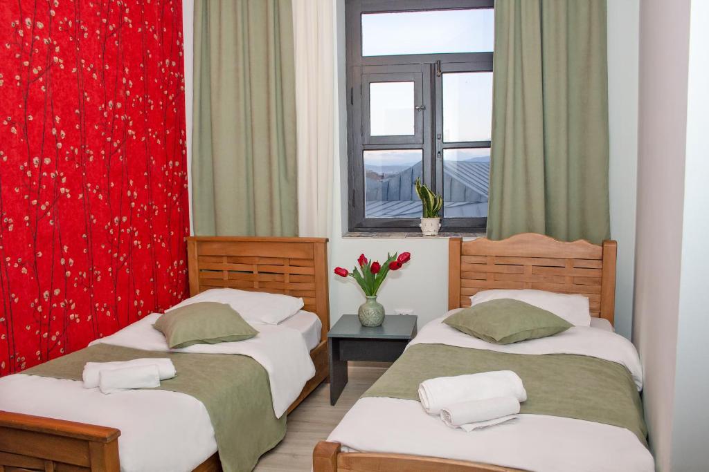 Postel nebo postele na pokoji v ubytování Check Point Hotel