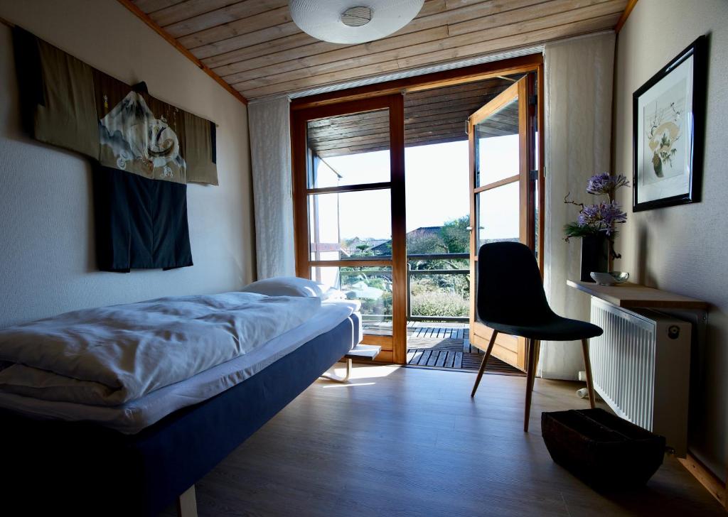Postel nebo postele na pokoji v ubytování Den Japanske Have B & B