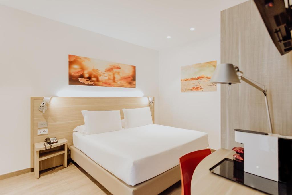 Postel nebo postele na pokoji v ubytování Privilege Apartments