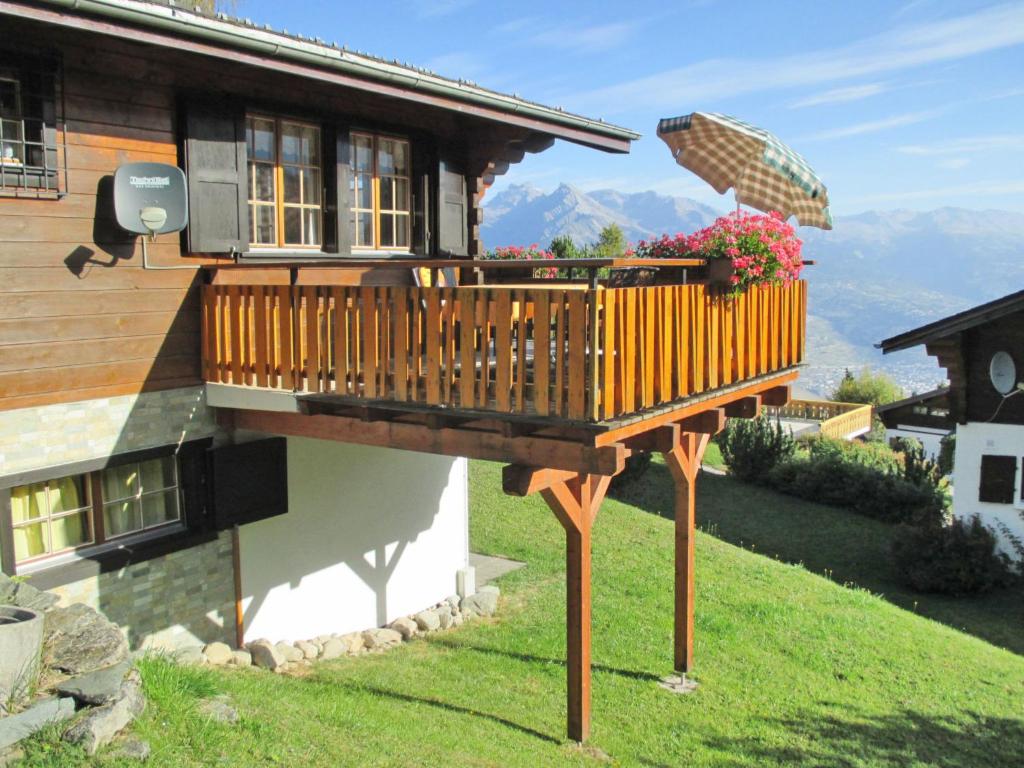 a deck on the side of a house at Chalet L'Alouette by Interhome in Nendaz