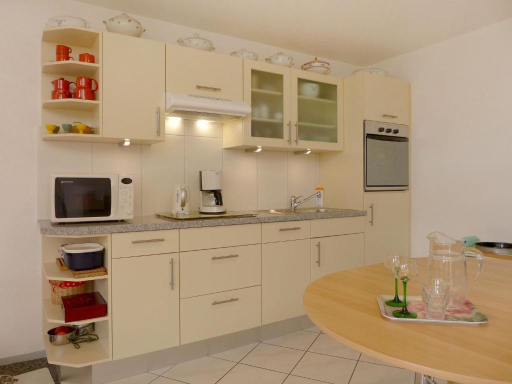 Kuchyň nebo kuchyňský kout v ubytování Apartment Am Brienzersee by Interhome