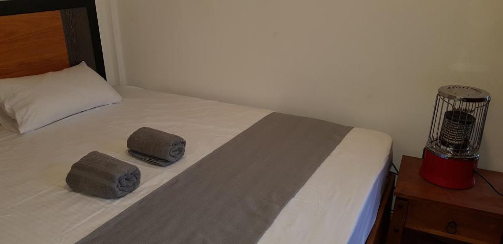 Postel nebo postele na pokoji v ubytování Hotel ColdWorld