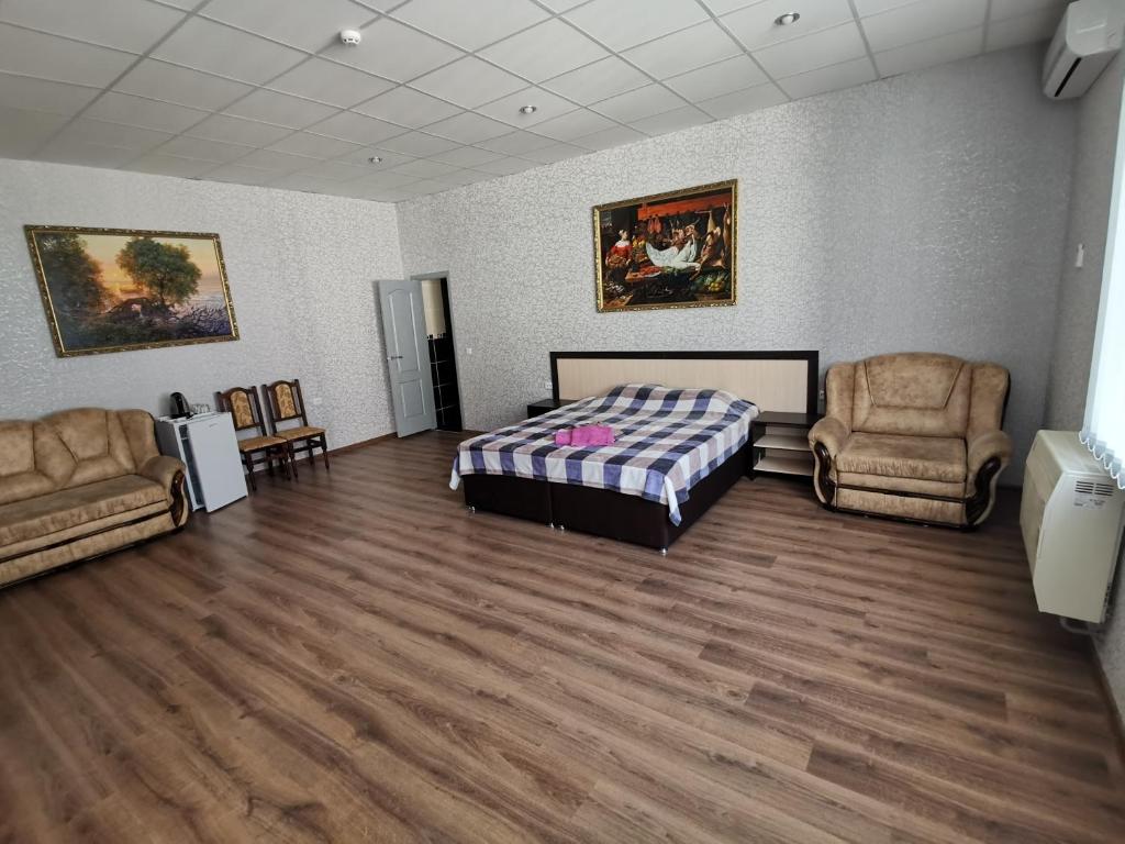 Postel nebo postele na pokoji v ubytování Premium Hotel