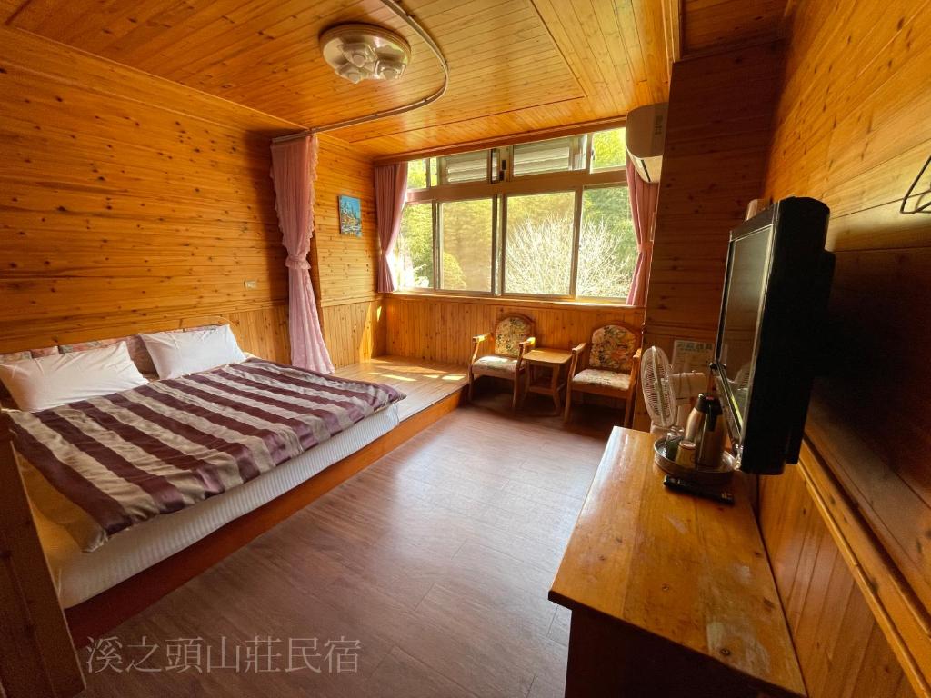 Postel nebo postele na pokoji v ubytování Xi Zhi Tou Homestay
