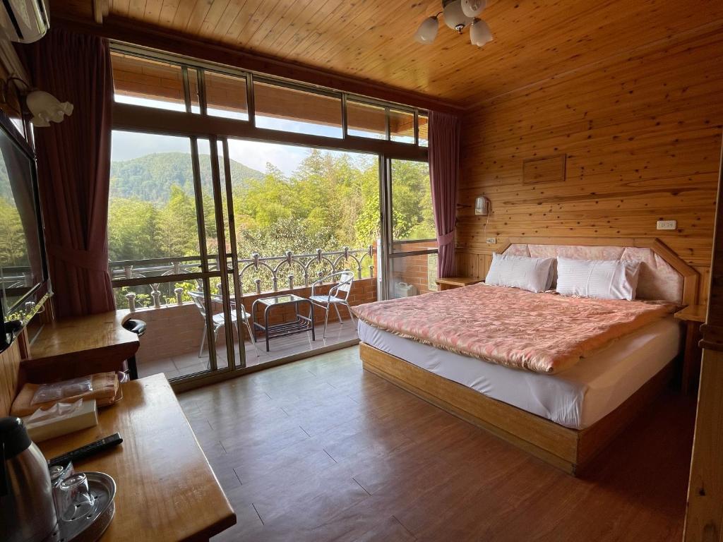 Postel nebo postele na pokoji v ubytování Xi Zhi Tou Homestay