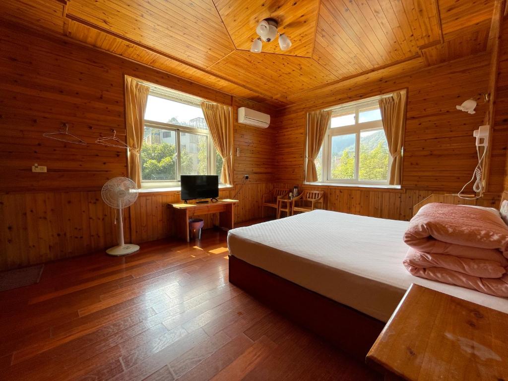 Postel nebo postele na pokoji v ubytování Xi Zhi Tou Homestay