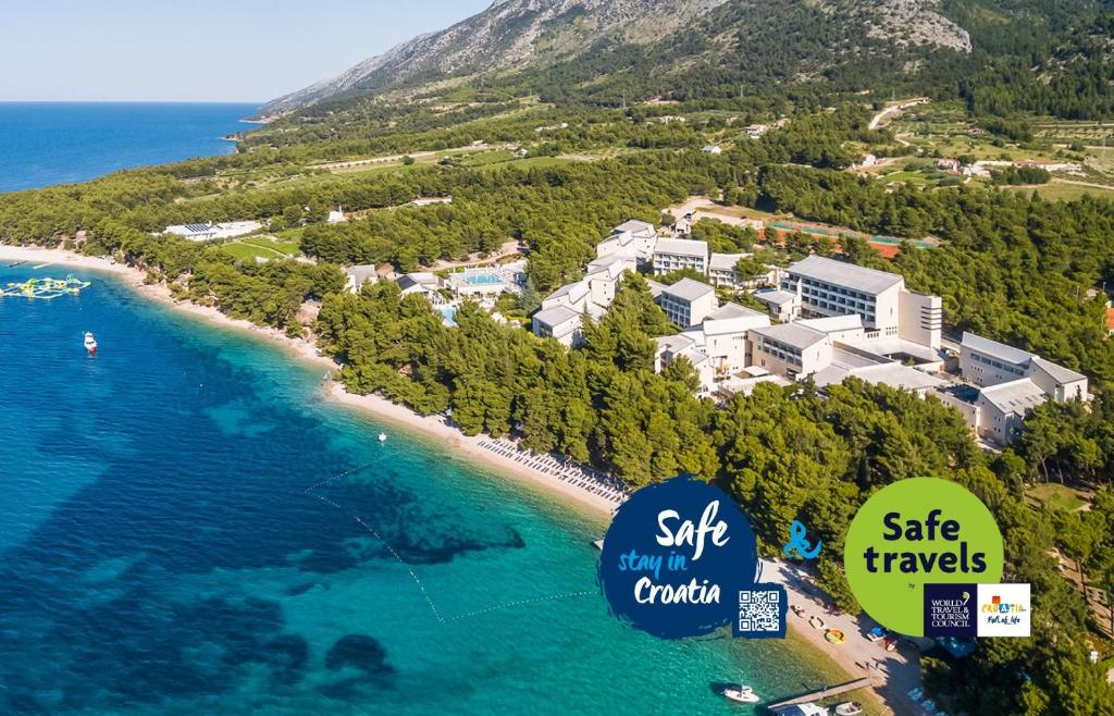 an aerial view of a resort on a beach at BRETANIDE Sport & Wellness Resort - All Inclusive in Bol