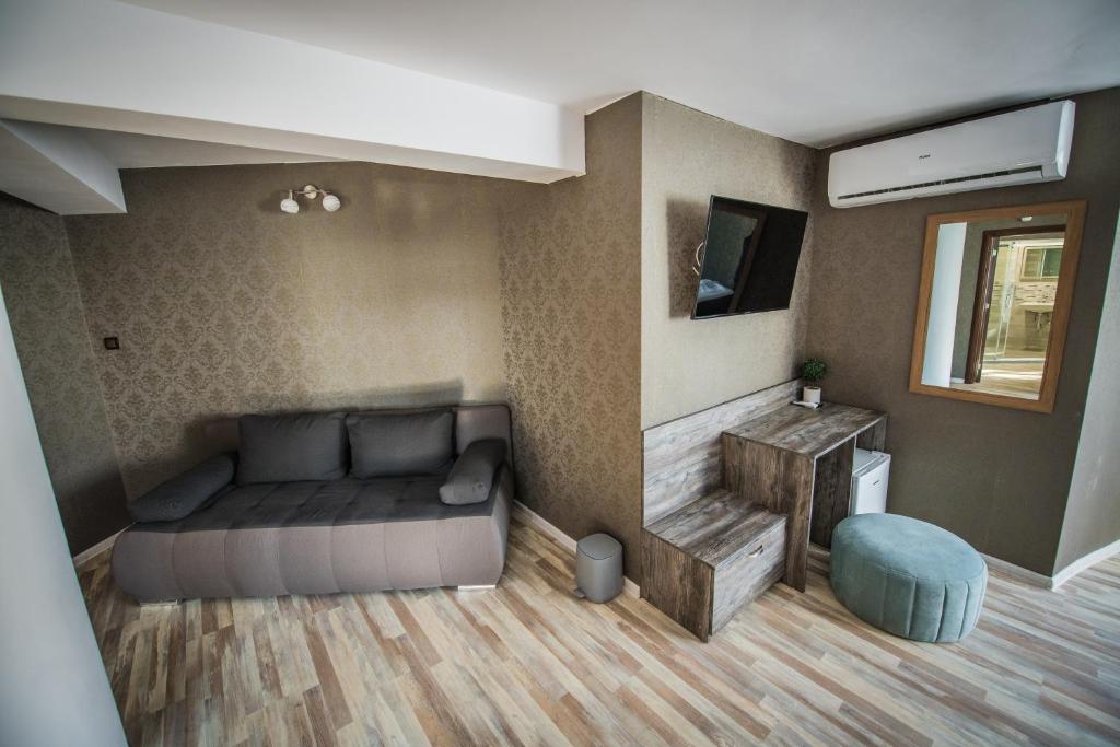 TV a/nebo společenská místnost v ubytování Vida Family Hotel