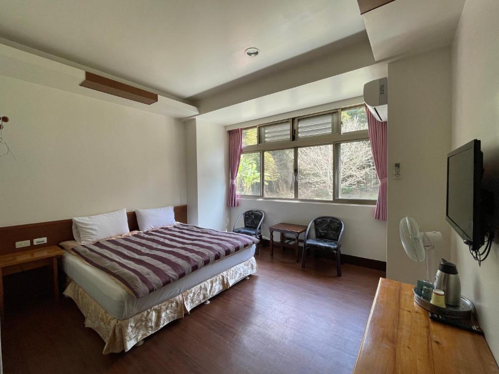 Postel nebo postele na pokoji v ubytování Xi Zhi Tou Homestay