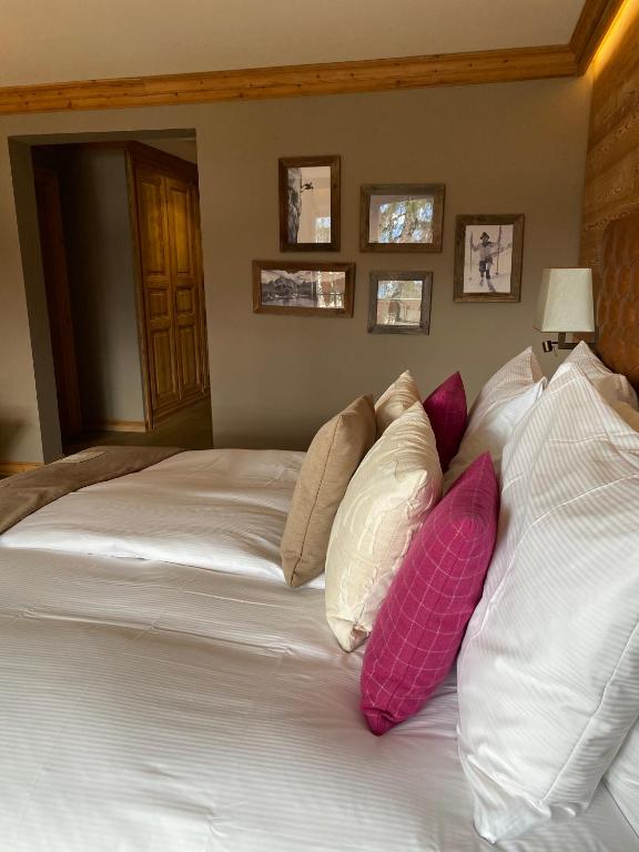 Postel nebo postele na pokoji v ubytování Hotel Royal