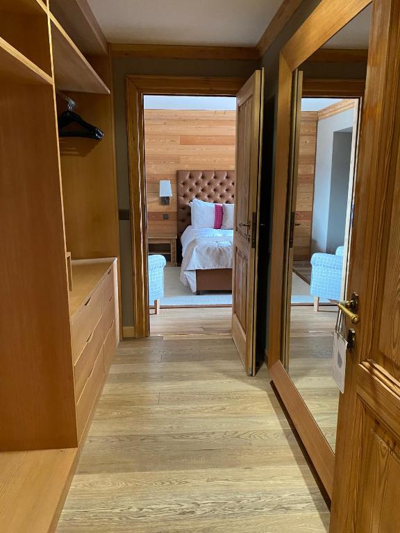 Postel nebo postele na pokoji v ubytování Hotel Royal