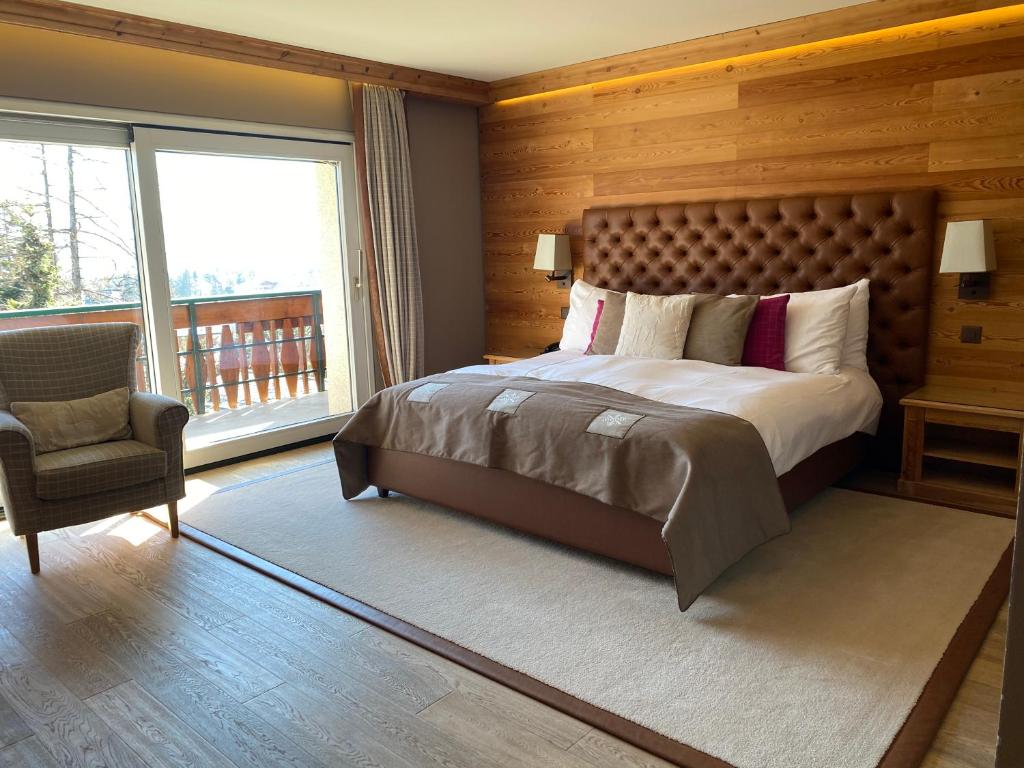 Postel nebo postele na pokoji v ubytování Hotel Royal