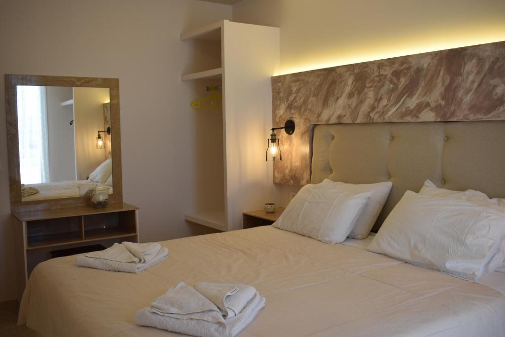 Postel nebo postele na pokoji v ubytování Kochylari Apartments