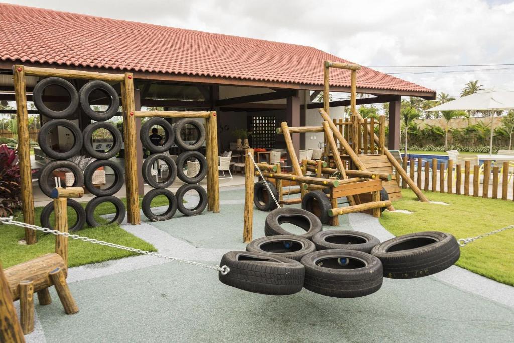  OKA Beach Resort Muro Alto Luxo por Carpediem