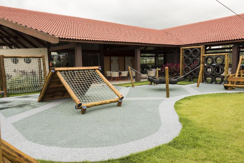  OKA Beach Resort Muro Alto Luxo por Carpediem