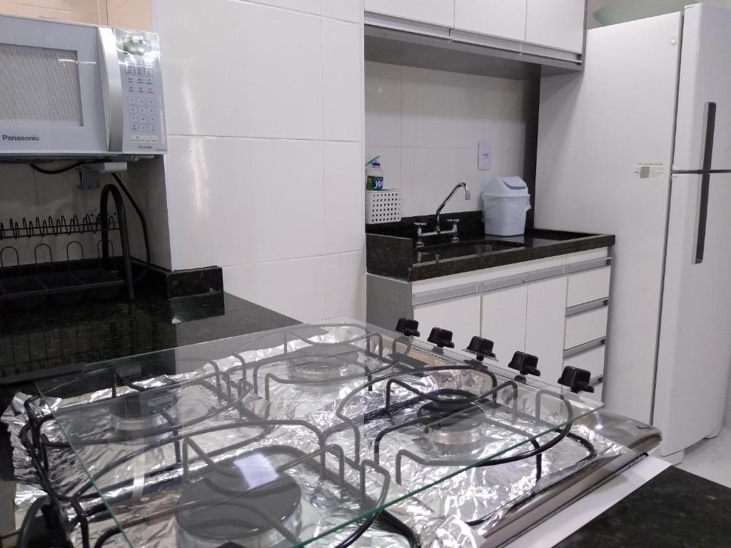  Ensolarado ao lado do shopping com garagem e Wifi