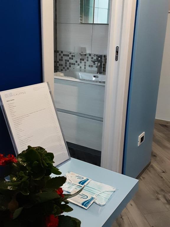 Kúpeľňa v ubytovaní Hotel Calypso
