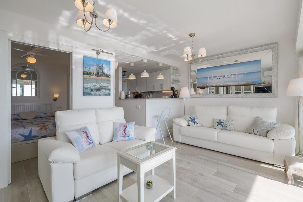 Posezení v ubytování UHC RODAS APARTMENTS