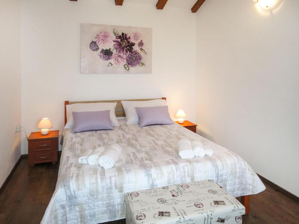 Postel nebo postele na pokoji v ubytování Holiday Home Tone by Interhome