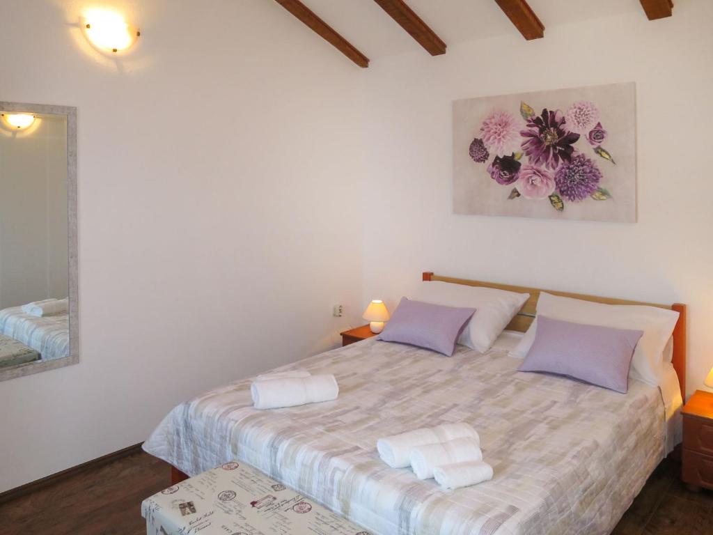 Postel nebo postele na pokoji v ubytování Holiday Home Tone by Interhome