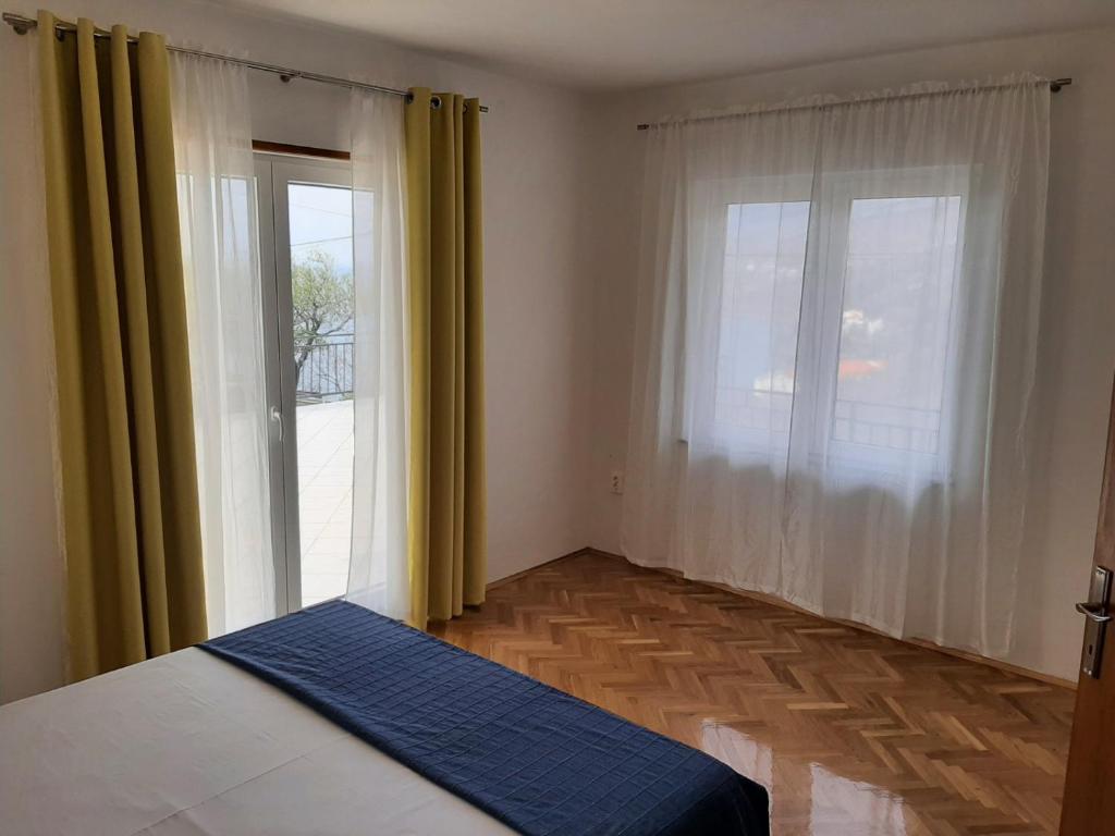 Posteľ alebo postele v izbe v ubytovaní Apartments Roby 3M