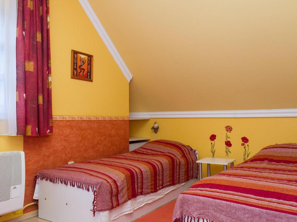 Posteľ alebo postele v izbe v ubytovaní Holiday Home Thuja by Interhome