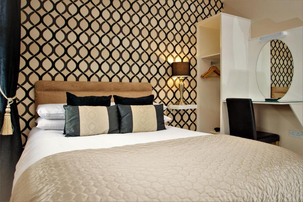 Letto o letti in una camera di Killaran House